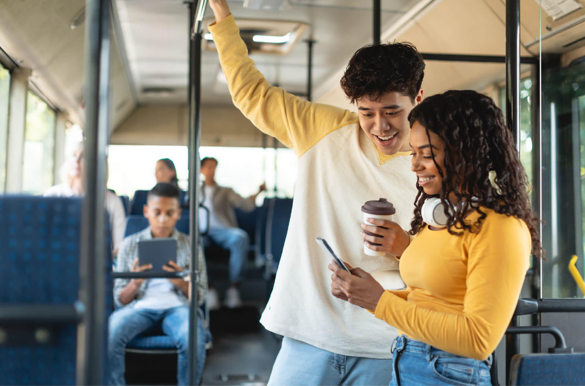 Riders on local transit near Derry Lane Towns